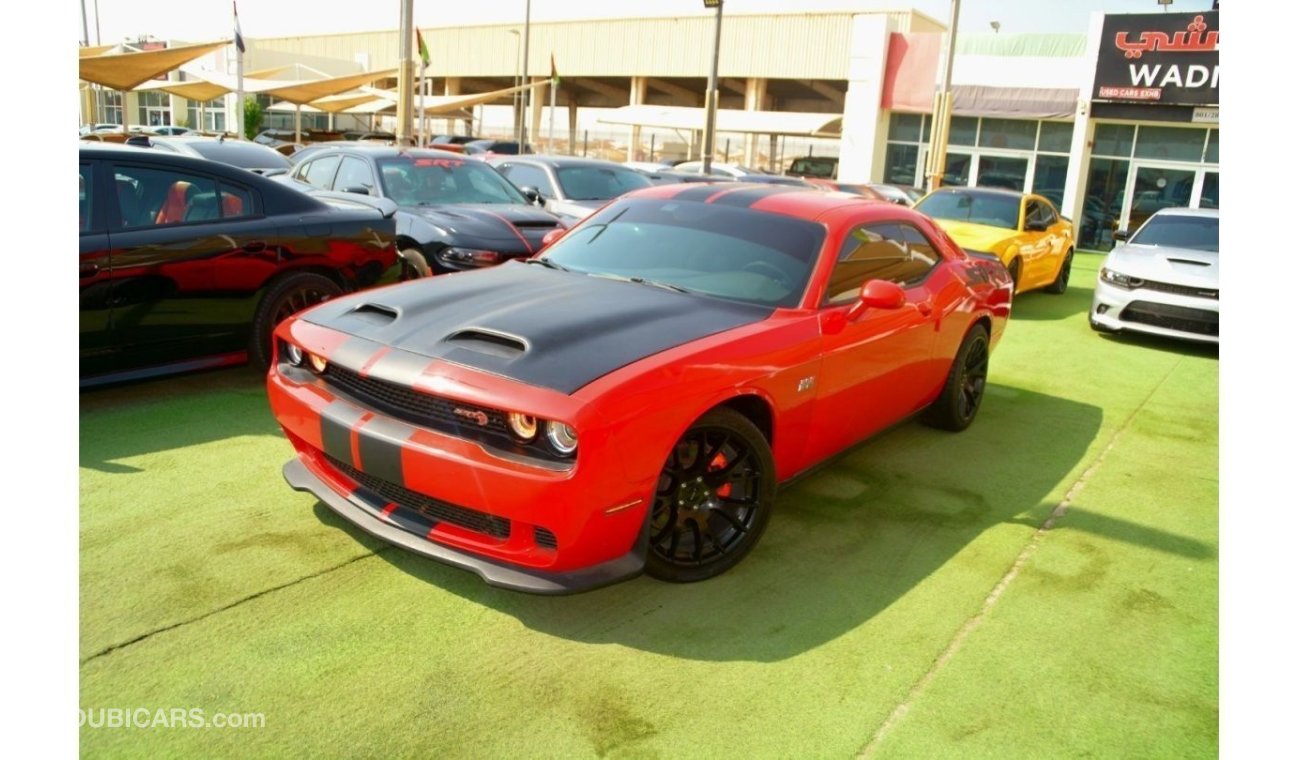 Dodge Challenger R/T Hemi engine 5.7 km hp?   The 5.7L HEMI® V8 engine continues the legend with power, armed with a