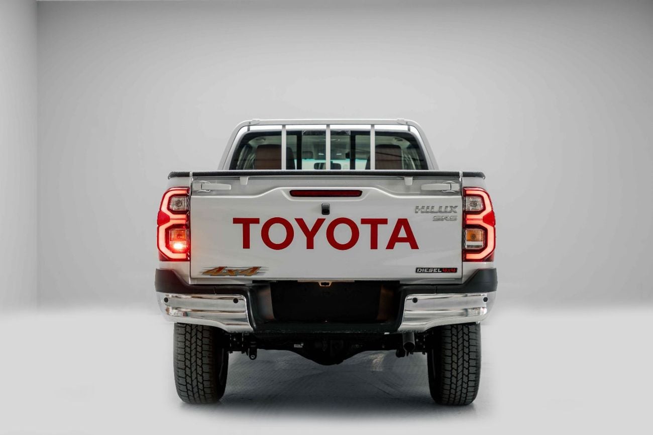 Toyota Hilux 2.4L - Platinum White Inside Maroon | Export Only