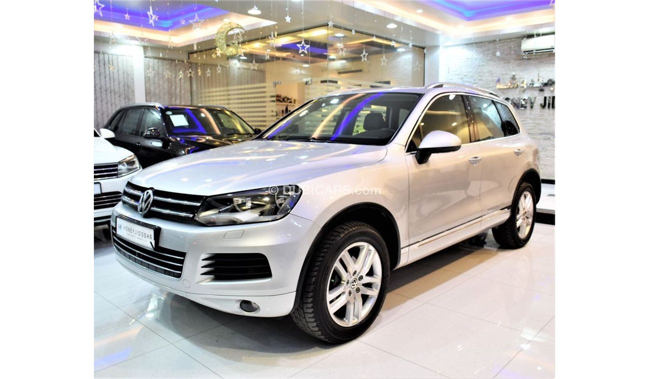 Volkswagen Touareg WITH SERVICE HISTORY Volkswagen Touareg 2011 Model! GCC Specs Silver Color!