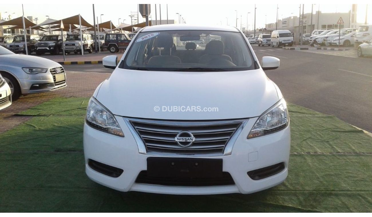 Nissan Sentra 2015 white 1.8 Gcc Excellent Condition without Accidents