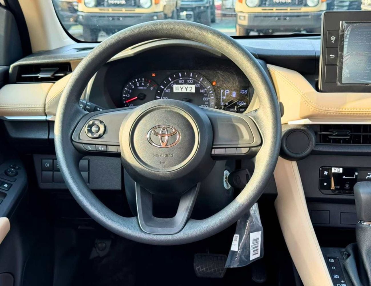 تويوتا يارس E  STANDRAD OPTION || 1.5L PETROL V4 | FABRIC SEATS | DVD | REAR PARKING SENSOR (CODE # YREO)