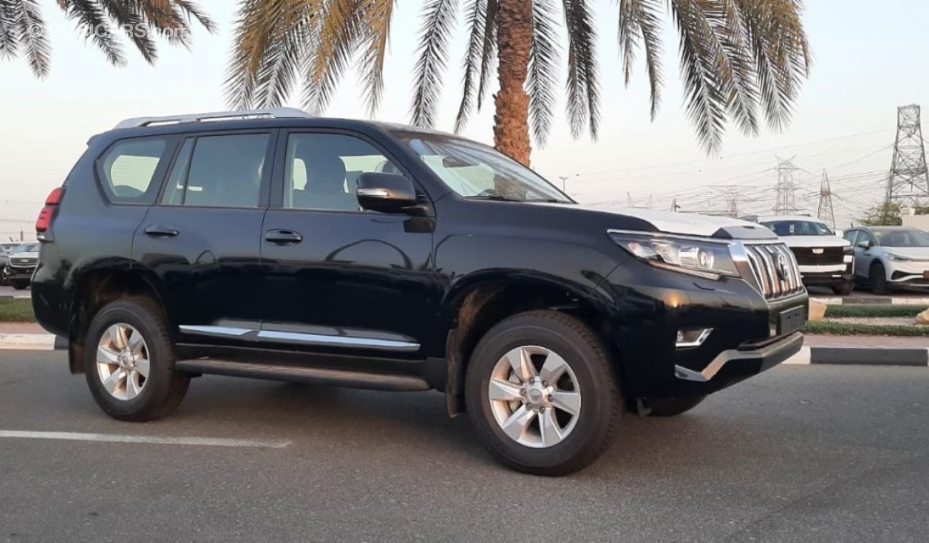 تويوتا برادو TOYOTA PRADO 2.7  TXL MID OPTION WITH SUNROOF OPEN AND COOL BOX BACK TYRE