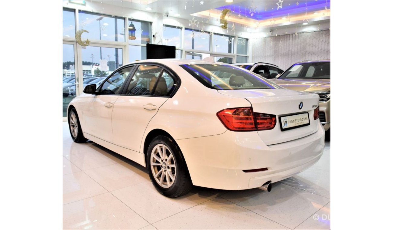 BMW 320i ORIGINAL PAINT ( صبغ وكاله ) BMW 320i 2015 Model!! in White Color! GCC Specs