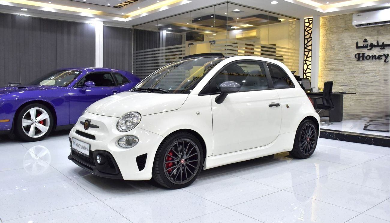 Abarth 595 EXCELLENT DEAL for our Abarth 595 Convertible Competizione ( 2022 Model ) in White Color GCC Specs
