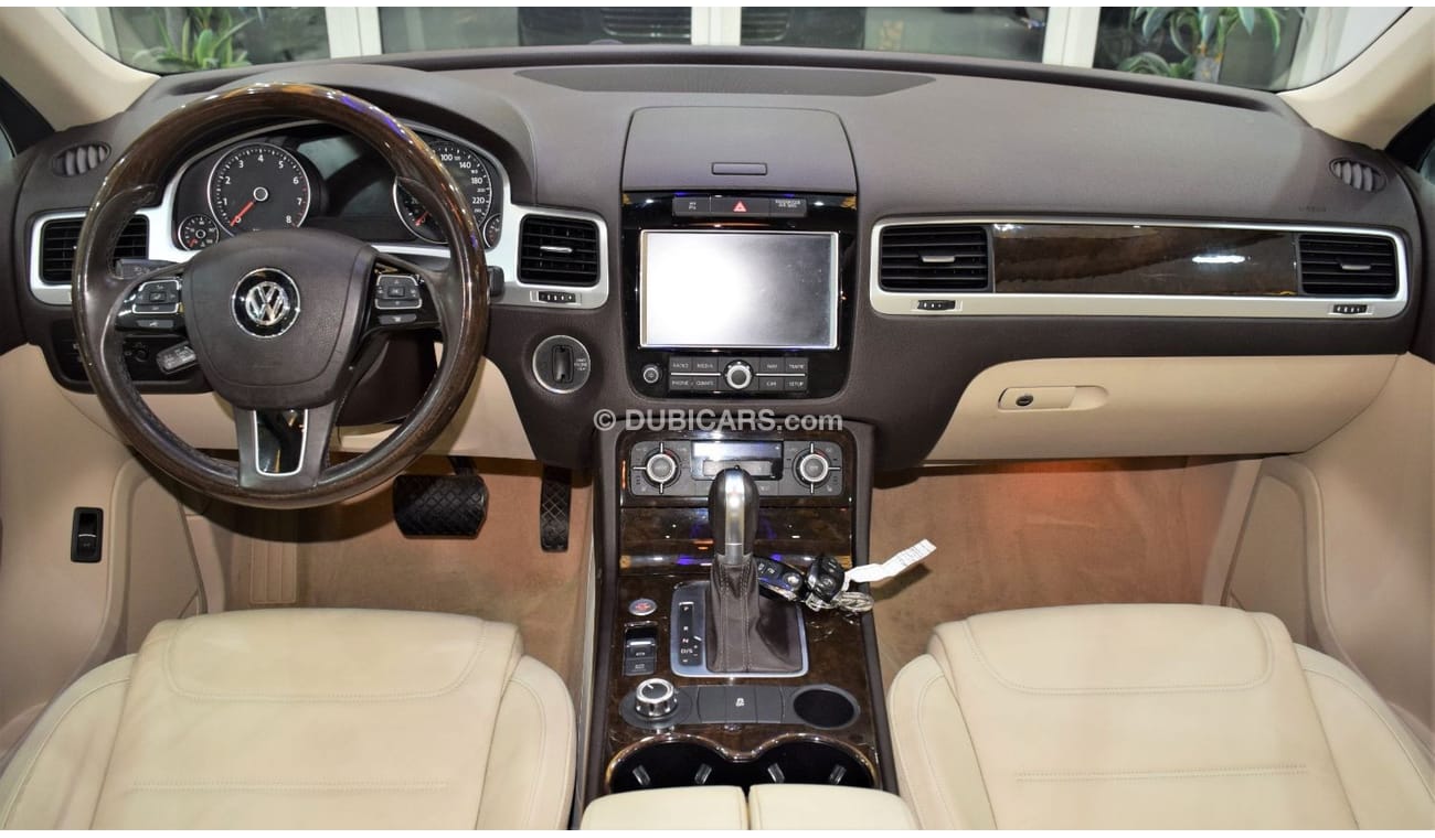 Volkswagen Touareg SEL EXCELLENT DEAL for our Volkswagen Touareg ( 2015 Model! ) in Blue Color! GCC Specs