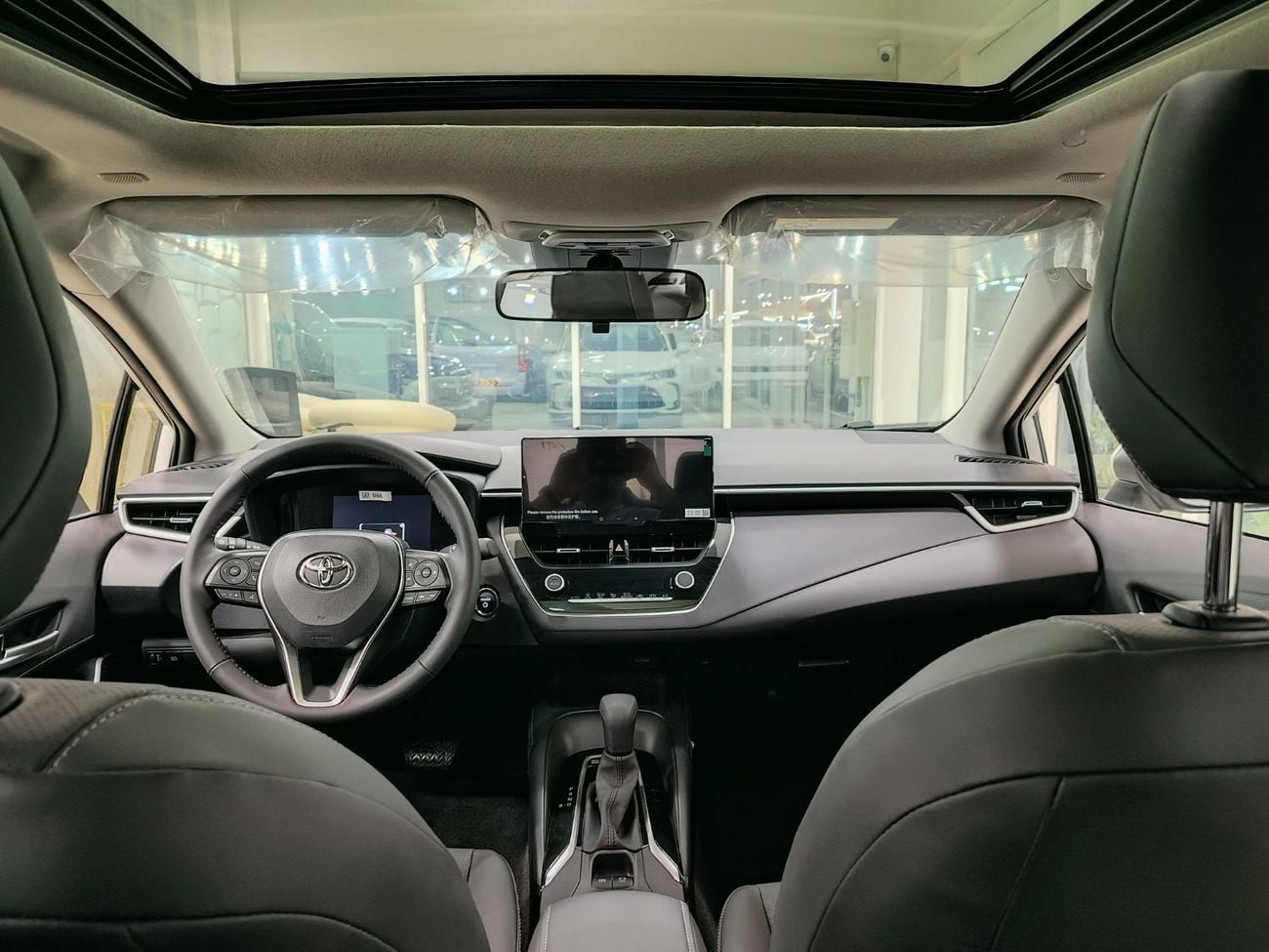 تويوتا كورولا GLI Moonroof Hybrid 1.8L