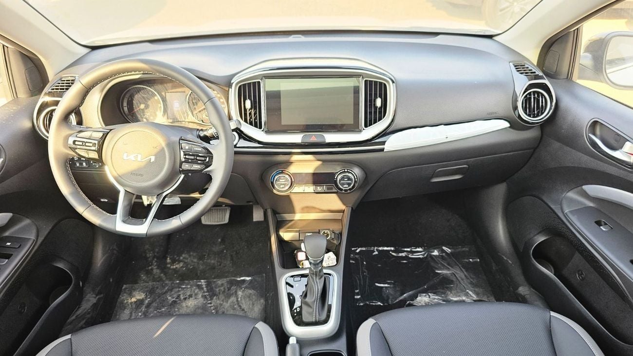 كيا KX1 Kia KX1 DUAL TONE 1.4L V4 PETROL CVT WITH SUNROOF PUSH START DVD CAMERA