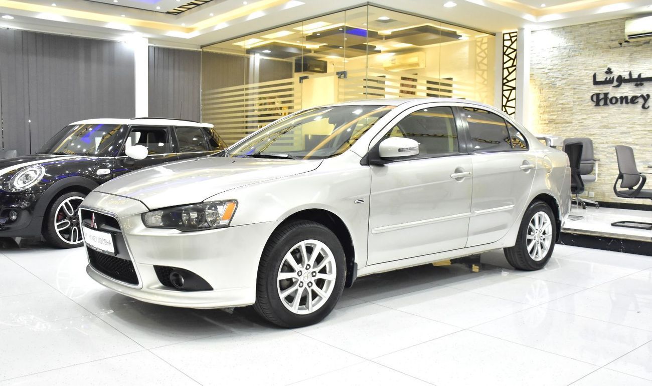 Mitsubishi Lancer EX EXCELLENT DEAL for our Mitsubishi Lancer EX ( 2015 Model ) in Beige / Silver Color GCC Specs