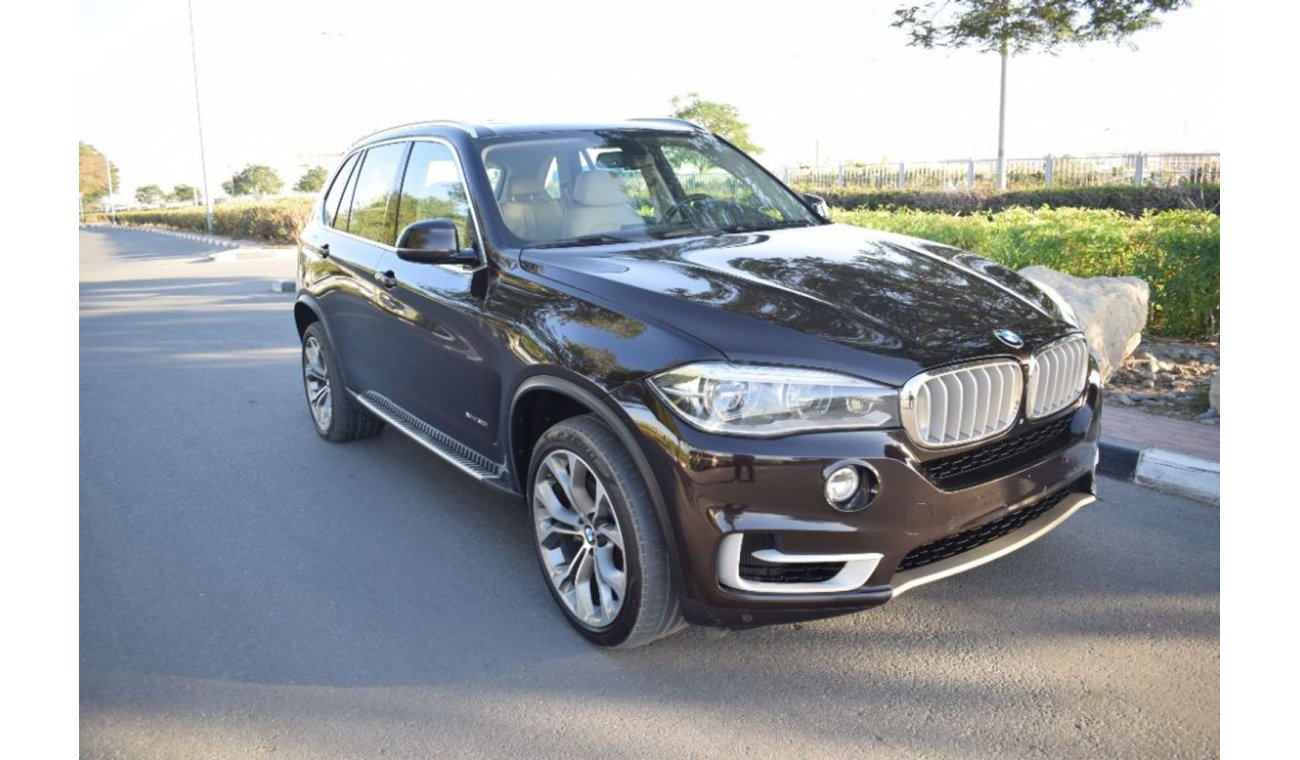 بي أم دبليو X5 XDrive 50i - 2014 - GCC Specs - Immaculate Condition