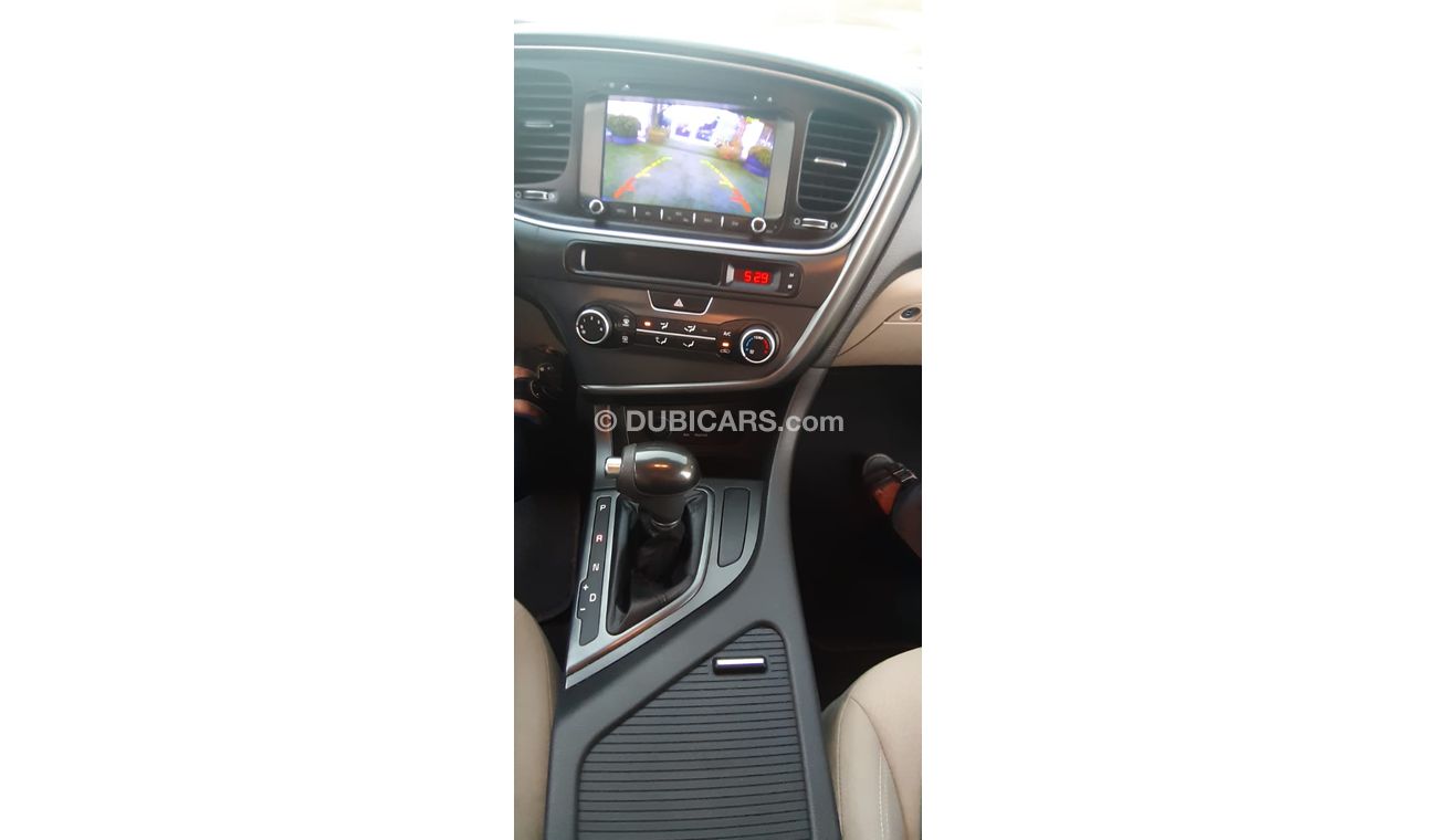 كيا أوبتيما خليجى رقم 2  شاشة   كاميرا  مثبت  سرعة  جناح خلفى رنجات حساسات أنوار ضباب بحالة ممتازة