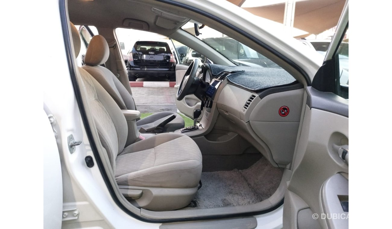 Toyota Corolla Toyota Corolla 2013 model Gulf 1600 CC, white inside beige, without accidents, Android screen, camer