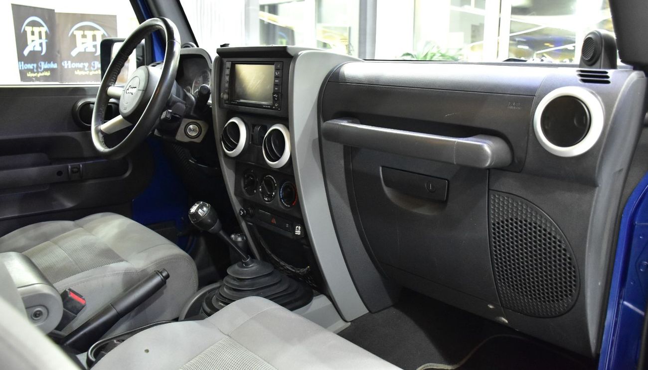 Jeep Wrangler EXCELLENT DEAL for our Jeep Wrangler Sahara ( 2009 Model ) in Blue Color GCC Specs