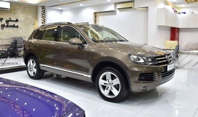 Volkswagen Touareg SEL EXCELLENT DEAL for our Volkswagen Touareg ( 2015 Model ) in Brown Color GCC Specs