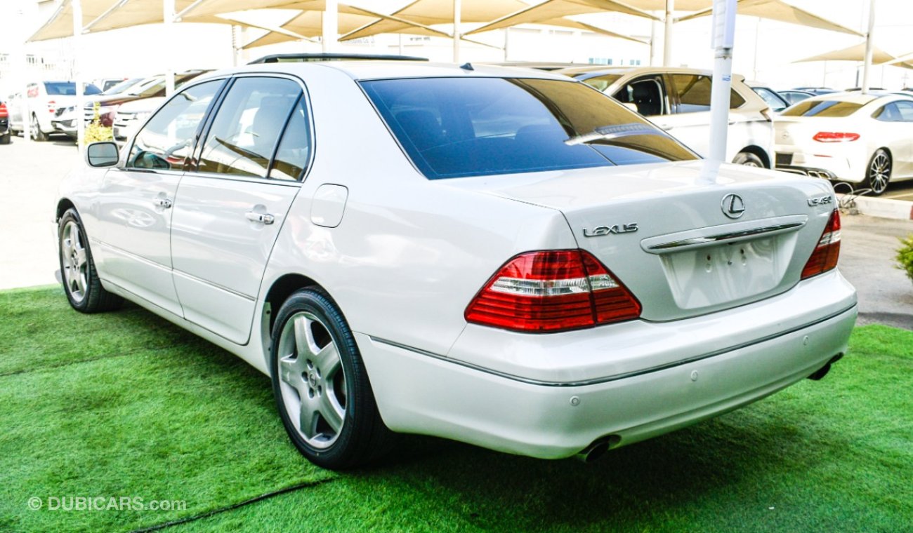 Lexus LS 430 Imported 1/2 Ultra 2006 model, white color, leather opening, wooden wheels, electric mirrors, electr