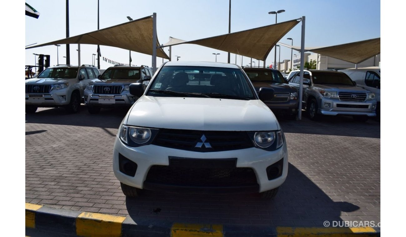 Mitsubishi L200 Std Mitsubishi L200 D/c Pick up 4x2 Diesel, Model:2012. Excellent condition