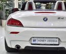 BMW Z4 EXCELLENT DEAL for our BMW Z4 sDrive35i ( 2014 Model ) in White Color GCC Specs