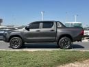 تويوتا هيلوكس The Toyota Hilux is a renowned mid-size pickup truck known for its exceptional ruggedness, reliabili
