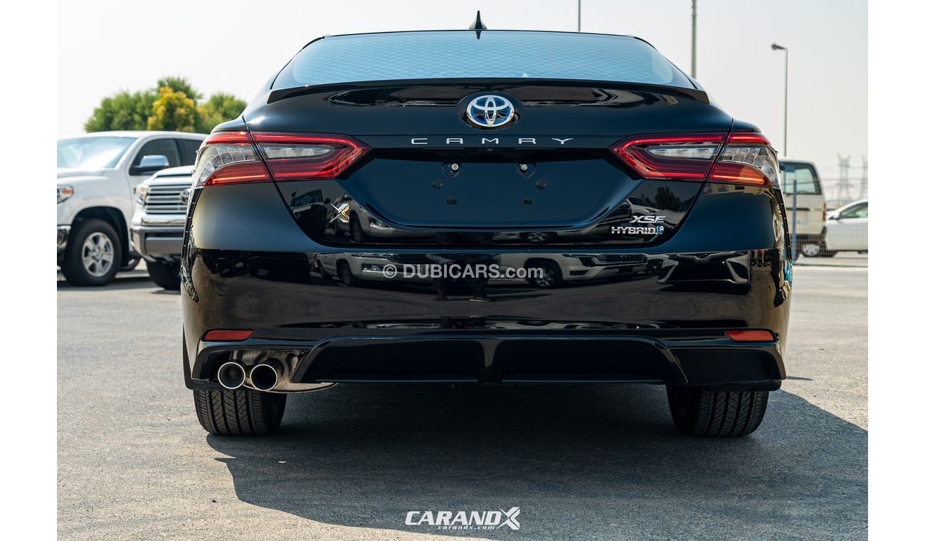 Toyota Camry XSE Hybrid Black / Red Interior