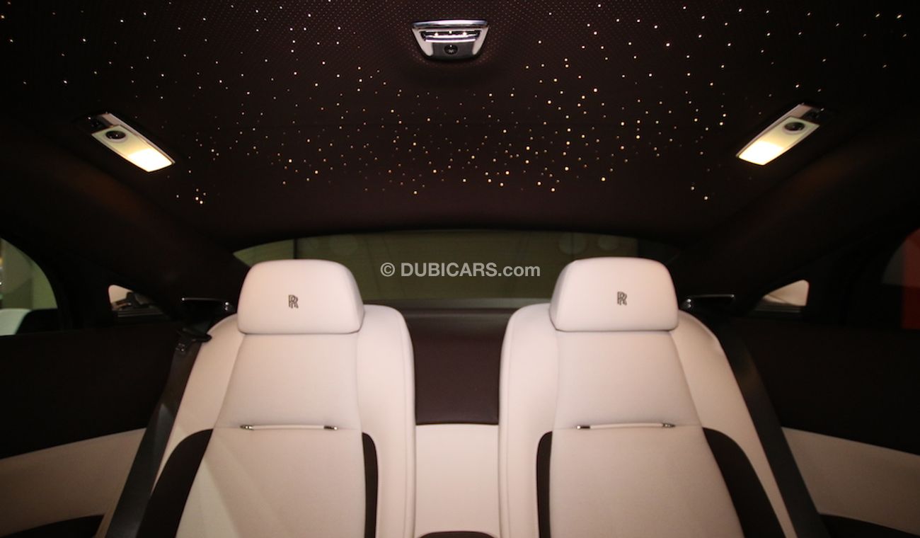 Rolls-Royce Wraith Original Color:  Brown | Silver  ( car with White Vinyl Sticker )