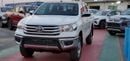 تويوتا هيلوكس double cabin 2.4 Diesel ,,,4X4,,, white color Black interior 2026 Basic option