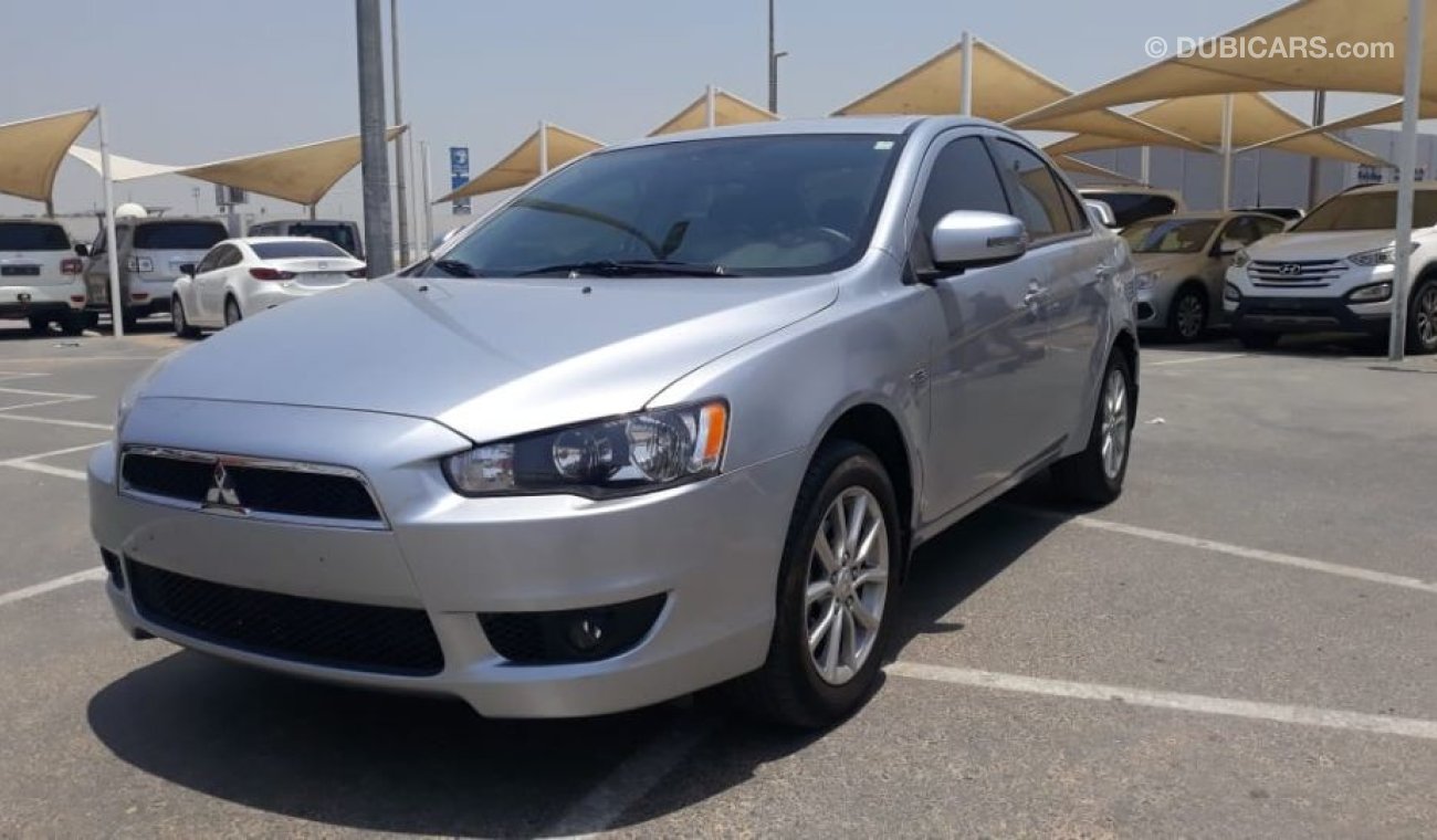 Mitsubishi Lancer السيارة نظيفه جدا بحاله ممتازه بدون حوادس ضمان شاسيه جير ماكينه