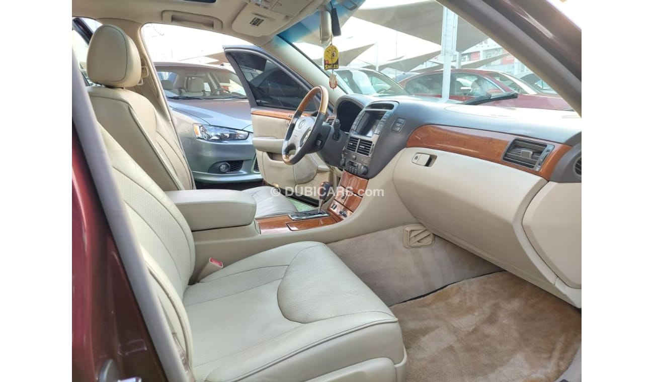 لكزس LS 430 موديل 2005 وارد1/2 الترا لون احمر داخل بيج مثبت سرعه تحكم فتحه جلد رنجات بحاله ممتازه