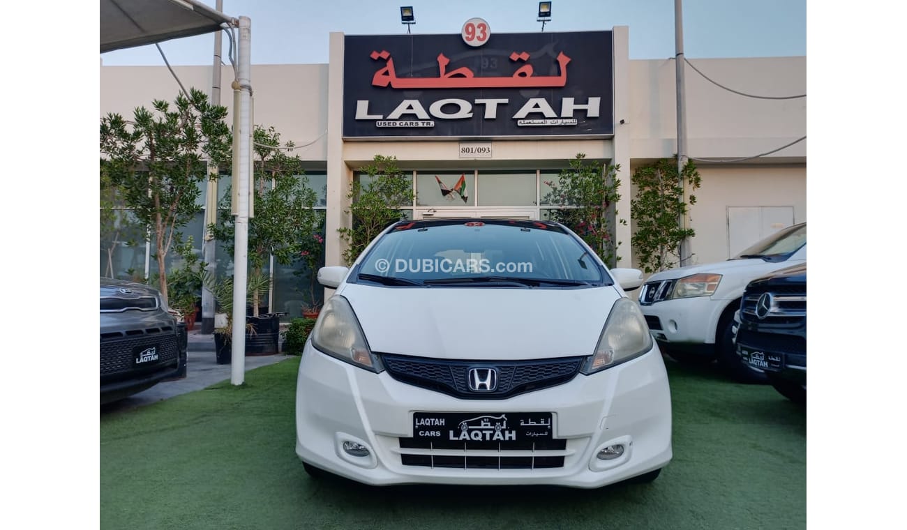 Honda Jazz Gulf model 2014 hatchback, panoramic, cruise control, alloy wheels, excellent condition