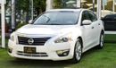Nissan Altima White color inside Big Ward No.1 fingerprint slot, leather alloy wheels, camera screen control senso