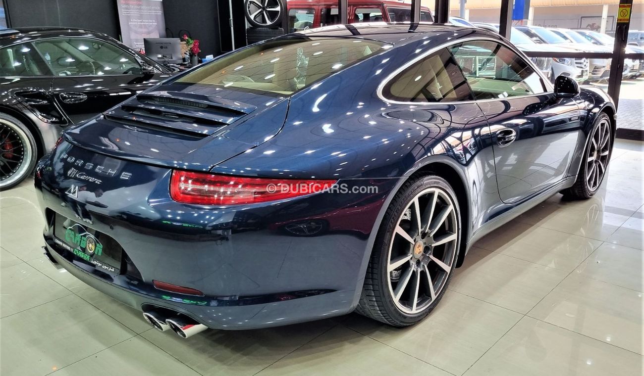 بورش 911 PORSCHE 911 CARRERA GCC IN PERFECT CONDITION FULL SERVICE HISTORY FROM PORSCHE FOR 249K AED