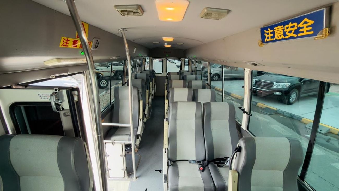 Toyota Coaster Fully luxury seats fully covered by cameras