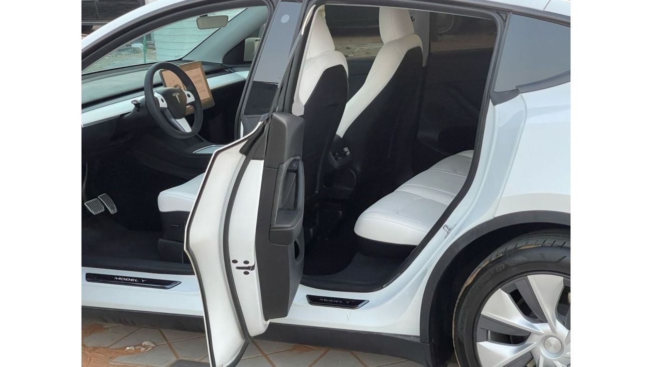 Tesla Model Y TESLA MODEL Y LONG RANGE DUAL MOTOR MODEL : 2023 MILEAGE : 24,000 km PRICE : 172,000 DIRHAMS Gulf sp