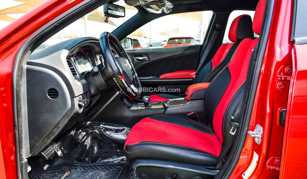 Dodge Charger Import - number one - manhole - leather - rear spoiler - cruise control - wheels - sensors in excell