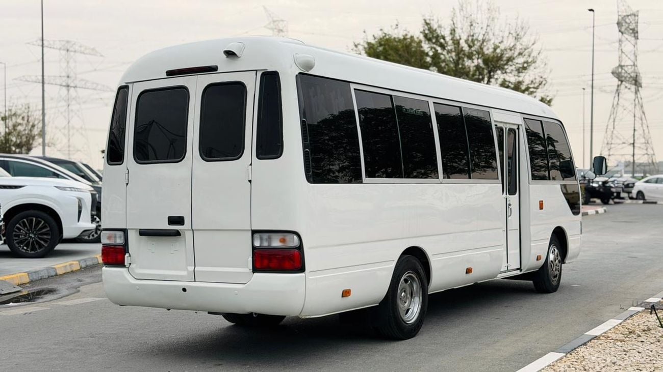 Toyota Coaster Fully luxury seats fully covered by cameras
