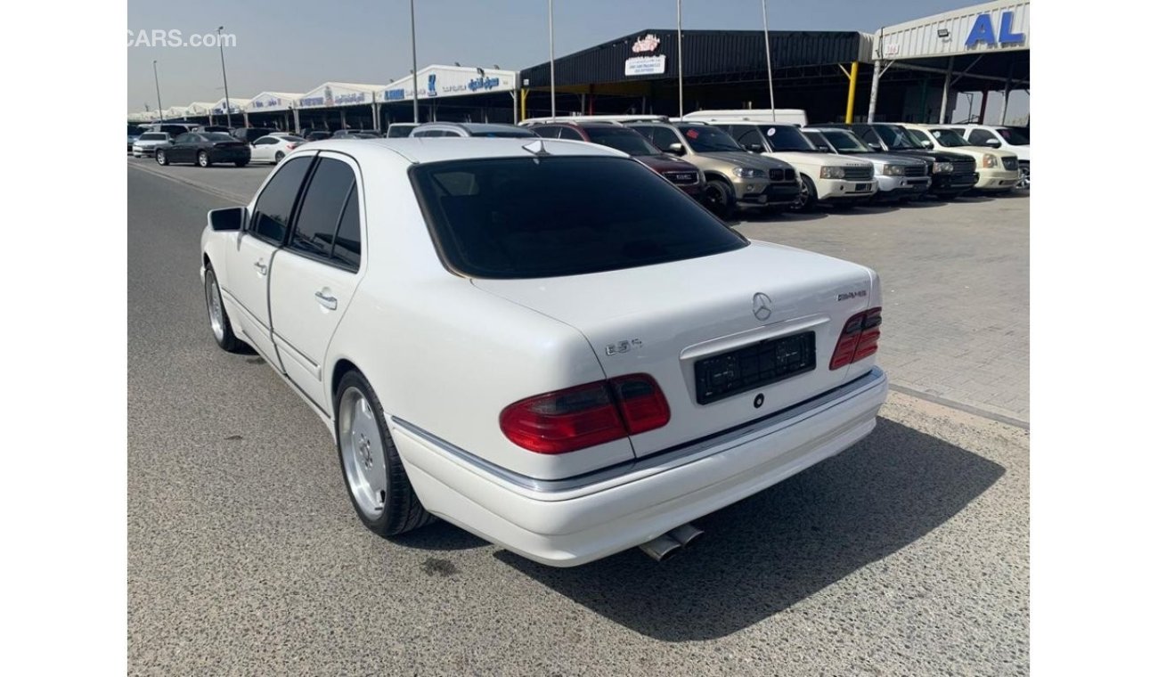 مرسيدس بنز E 320 موديل 1998 امريكي 6 سلندر كيت AMG 55 ابيض داخل بيج عداد الميل 198000