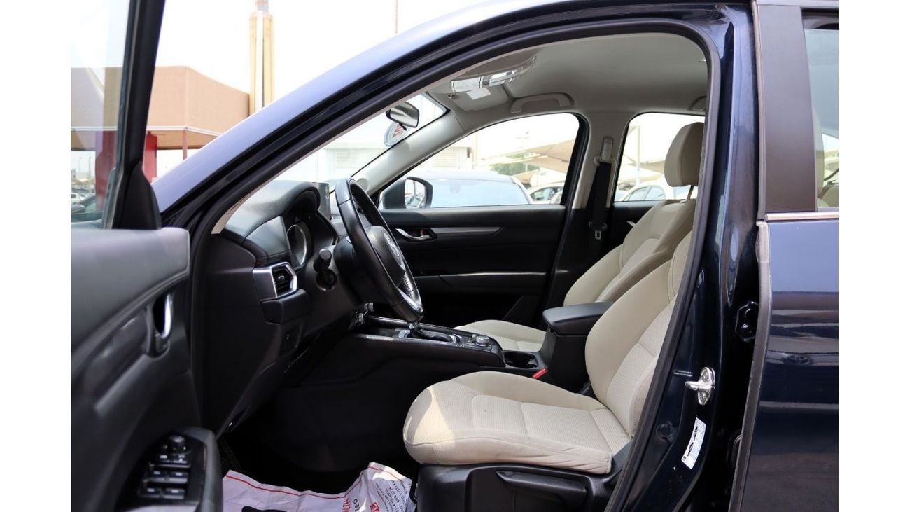 مازدا CX5 GL خالية من الحوادث - خليجي - صبغة وكالة - بحالة الوكالة من الداخل والخارج