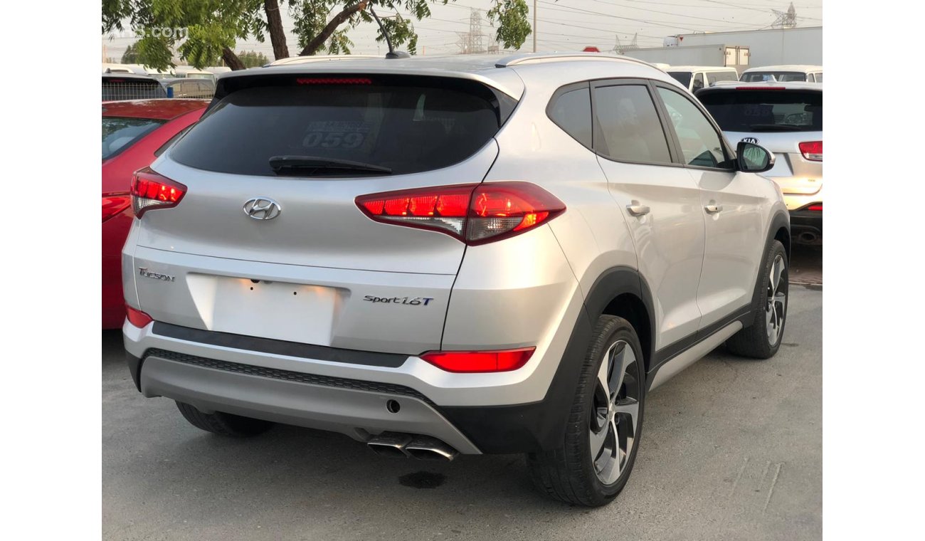 Hyundai Tucson 1.6L LTD TURBO EDITION, DVD+REAR CAMERA, POWER SEATS, NAVIGATION, ALLOY RMS 19'', PUSH STRT, LOT-637