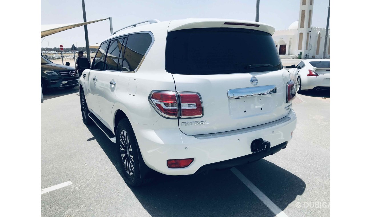 Nissan Patrol فل ابشن ماكينه كبيره صبغة وكاله تشيكات وكاله داخل الضمان بحاله ممتاذه