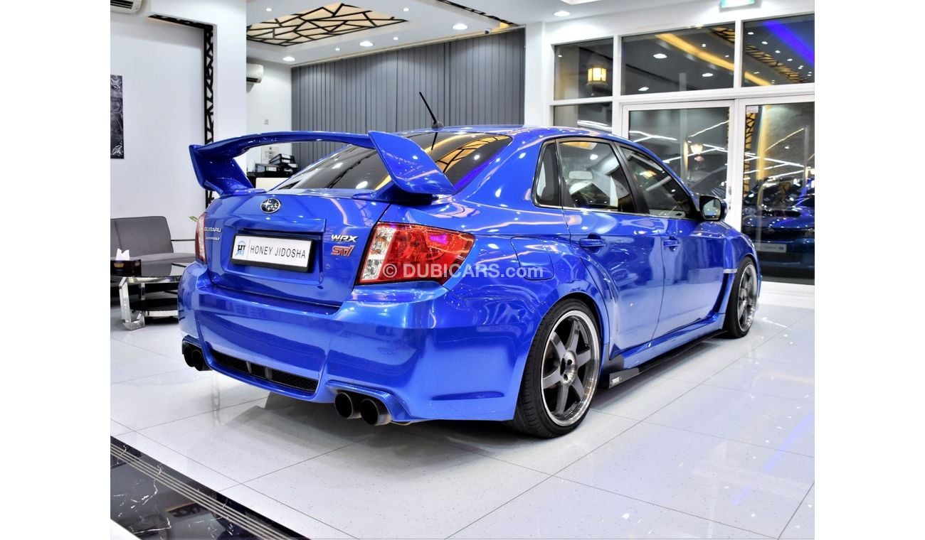 Subaru Impreza WRX EXCELLENT DEAL for our Subaru WRX STi AWD ( 2011 Model ) in Blue Color GCC Specs