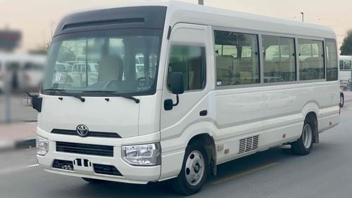 Toyota Coaster FULL OPTION — V6 — 4200cc — DIESEL—22 SEAT -- 3 POINT SEAT BILT - LUGGAGE RACK - CURTAINS - FRIDGE