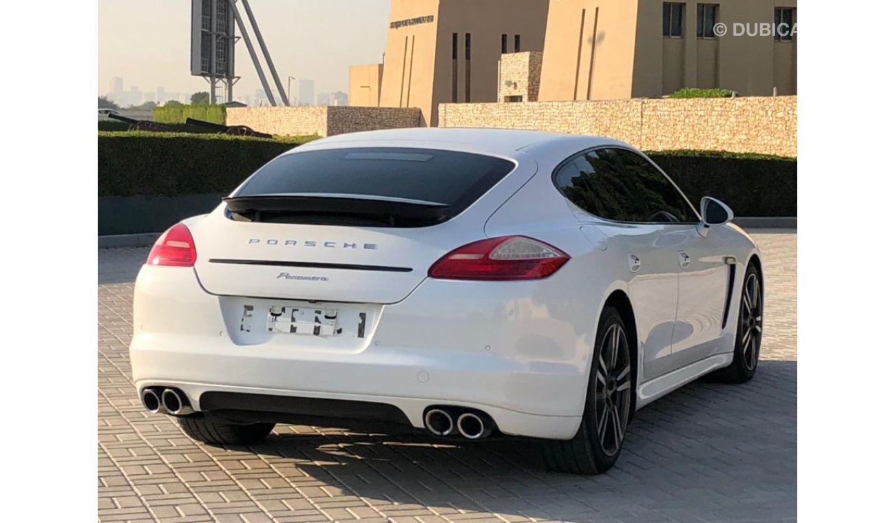 بورش باناميرا Porsche Panamera is the number one Gulf service, complete with agency condition