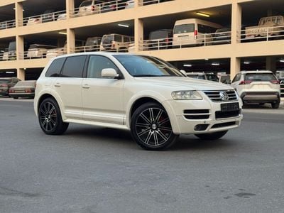 فولكس واجن طوارق فولكس فاجن طوارق W12 دفع رباعي، محرك بنزين W12، ناقل حركة أوتوماتيكي، مقاعد جلدية كاملة، مقاعد كهربا