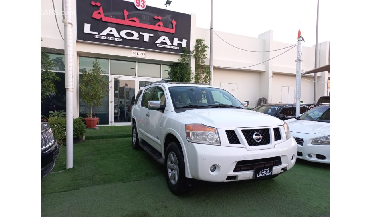 Nissan Armada Gulf model 2009  SE paint agency number one slot control unit in excellent condition