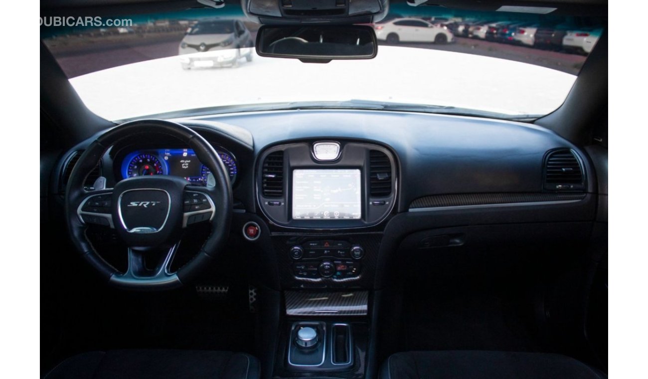 Chrysler 300C SRT8 Chrysler 300 SRT Model : 2015 Mileage : 197,000 km Price : 65,000 dirhams Gulf specifications ,