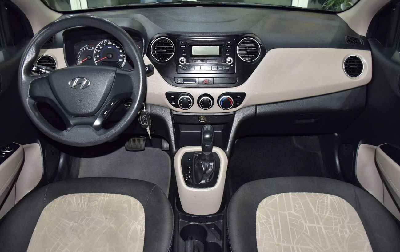 Hyundai Grand i10 EXCELLENT DEAL for our Hyundai Grand i10 ( 2018 Model ) in Red Color GCC Specs