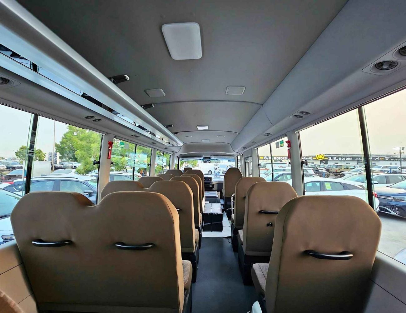 Toyota Coaster 2.7L PETROL M/T DUAL TONE || 23 SEATER | AUTO DOOR | HLF LUGGAGE RACK (CODE # COPB)