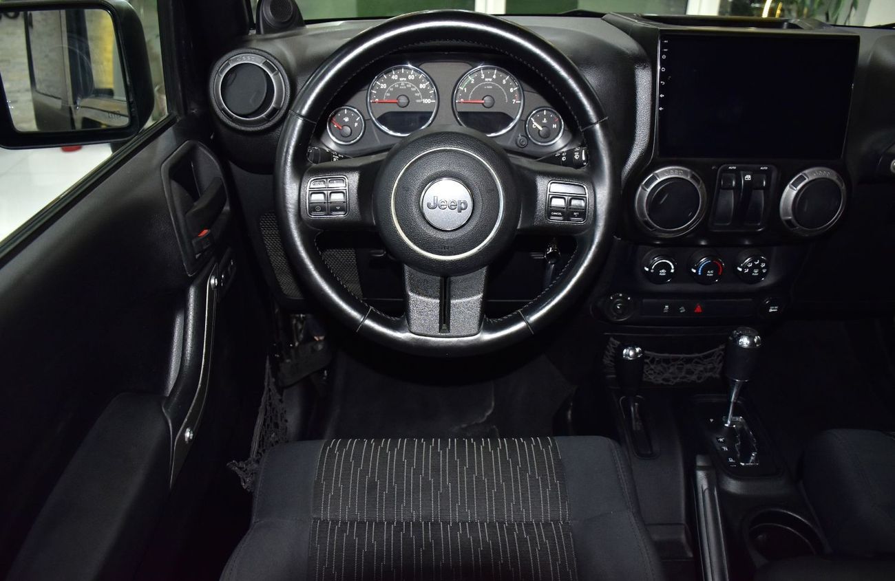 Jeep Wrangler EXCELLENT DEAL for our Jeep Wrangler Sport ( 2012 Model ) in Black Color American Specs