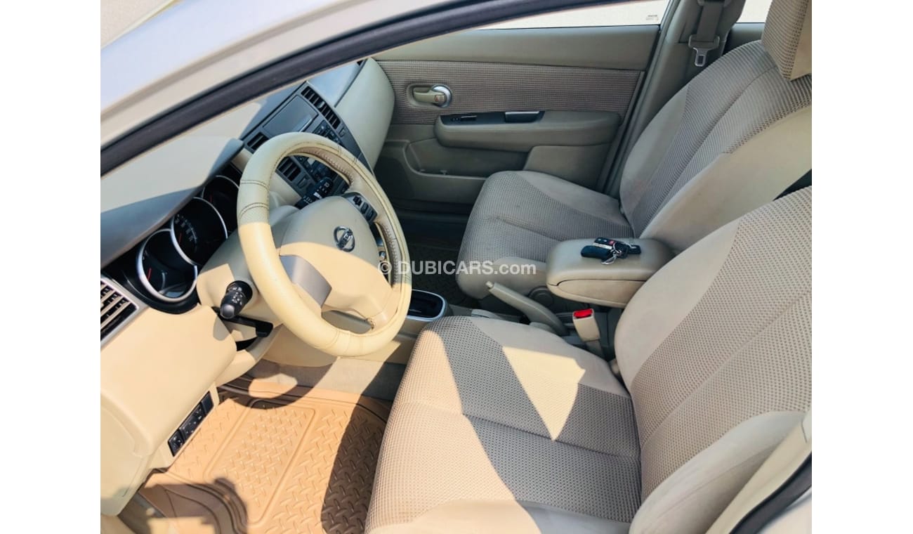 نيسان تيدا موديل 2012 خليجي فل مواصفات فتحه سقف مالك واحد من الوكاله مفتاحين فل مواصفات فتحه سقف