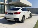 بي أم دبليو X6 AED 1,880 P.M | 0% DOWN PAYMENT | BMW X6 XDRIVE35I M KIT | AGENCY SERVICE HISTORY | 2019 | GCC SPECS