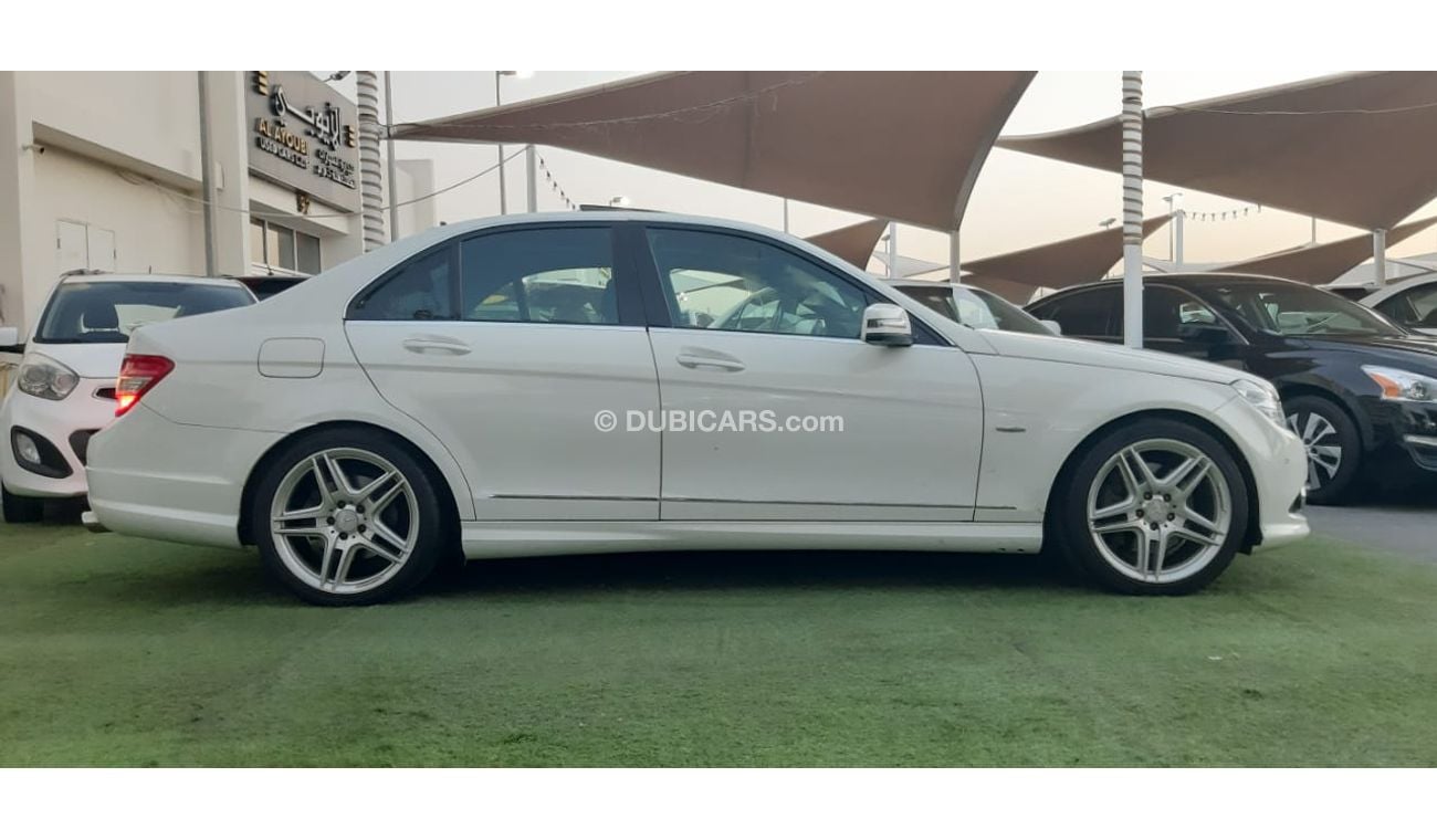 Mercedes Benz C350 Gulf panorama, full option, sensors, back wing, electric chair, white color wheels inside saffron, i