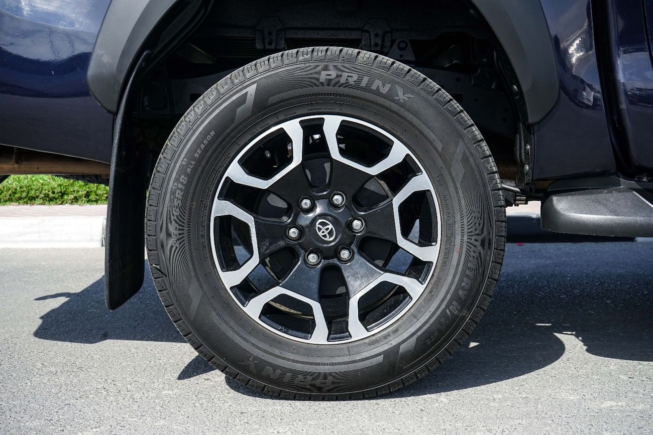 تويوتا هيلوكس The Toyota Hilux is a legendary, tough, and reliable mid-size body-on-frame pickup truck known for i